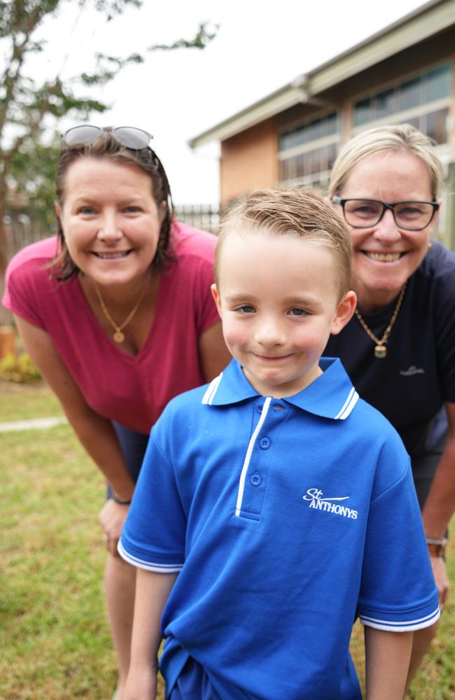 2023 prep students' first day at St Anthony's Primary School, Toowoomba. Harry Waller with Leisa Phillips and Meg Gardner.