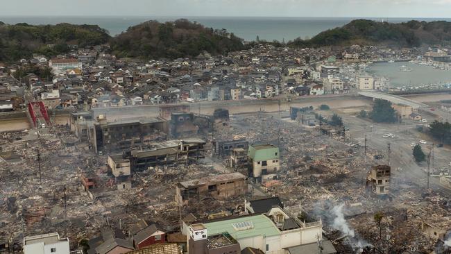 This aerial photo shows smoke rising from an area following a large fire in Wajima, Ishikawa prefecture on January 2, 2024. Picture: Fred MERY / AFP