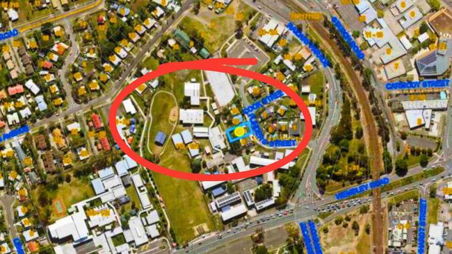 The block of land is marked by a yellow dot within the red circle which outlines part of Woodridge State School. Picture: Contributed