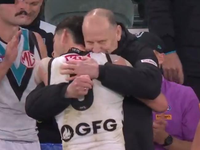 Port Adelaide coach Ken Hinkley hugs player Zak Butters on the siren of Sunday’s match with St Kilda. Picture: Fox Sport