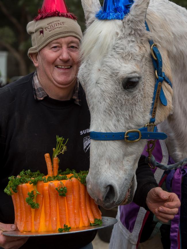 Graham Salisbury helps Subzero celebrate his 28th birthday last year. Picture Jay Town.