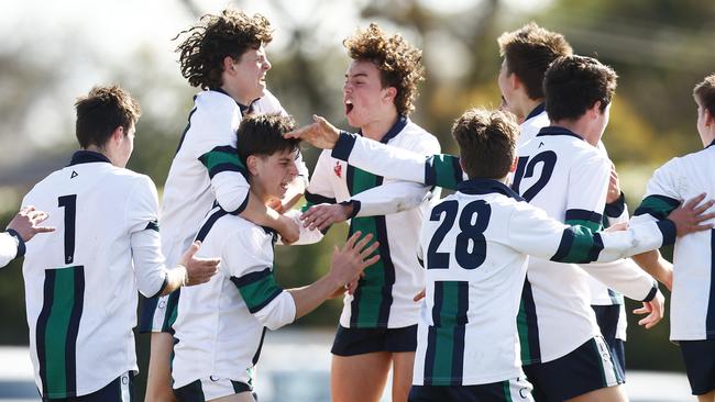 St Patrick's players celebrate a goal during last year’s grand final win. Picture: Daniel Pockett/AFL Photos/via Getty Images