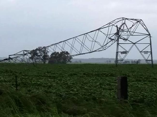 One of the transmission towers carrying power lines, which was toppled by high winds near Melrose in South Australia. Picture: Debbie Prosser/AFP