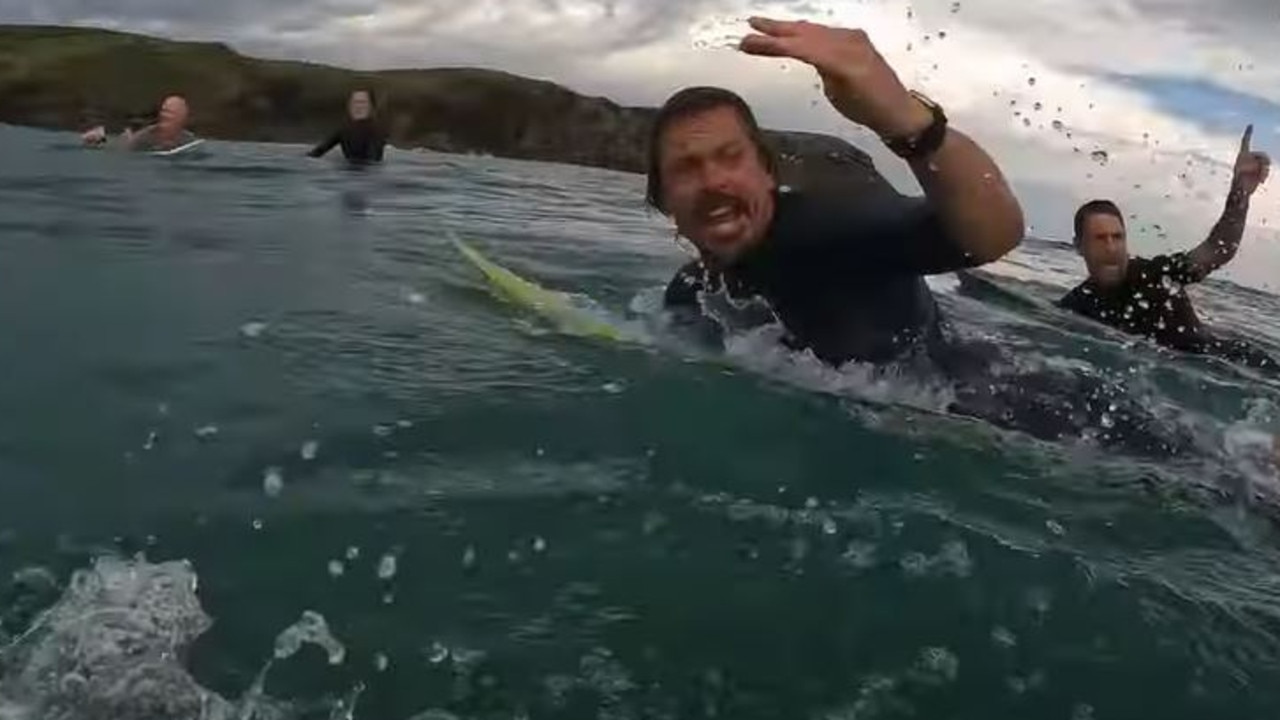 Another surfer advised the group to stay together and stop paddling. Picture: Storyful