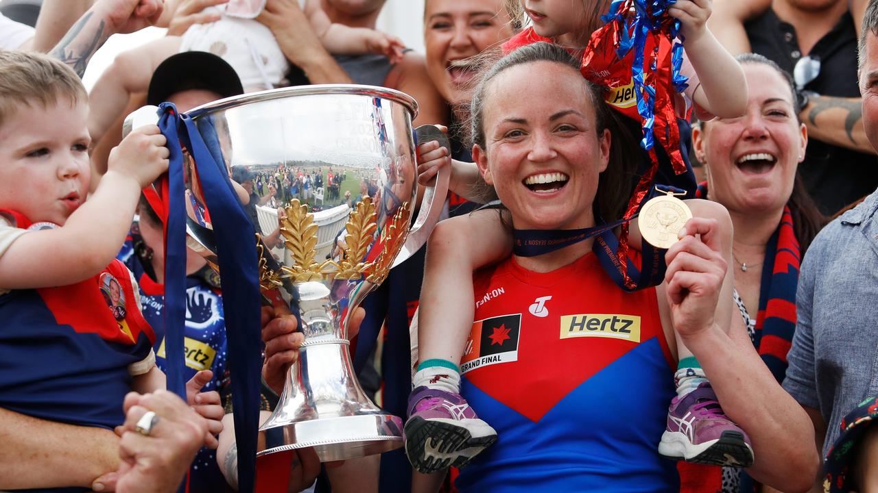 IPSWICH, AUSTRALIA - NOVEMBER 27: Daisy Pearce of the Demons celebrates with family during the 2022 AFLW Season 7 Grand Final match between the Brisbane Lions and the Melbourne Demons at Brighton Homes Arena, Springfield, Ipswich on November 27, 2022 in Ipswich, Australia. (Photo by Dylan Burns/AFL Photos via Getty Images)