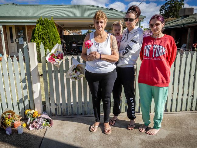 Neighbours leave flowers outside Ms Bates’ home. Picture: Jake Nowakowski