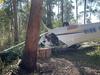 Pair taken to hospital after plane crash into thick bushland