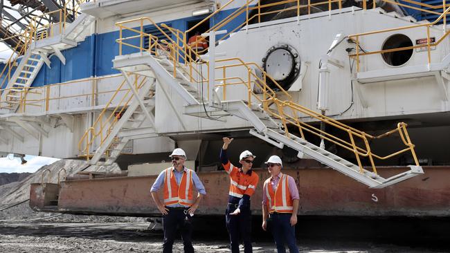 Opposition energy spokesman Chris Bowen, right, and Labor senator Anthony Chisholm with a BHP worker at the Gregory Crinum coal mine in Queensland. Picture: Supplied