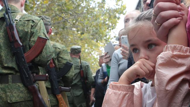 Families in Russian-annexed Crimea on Tuesday farewell reservists called up by Vladimir Putin’s partial mobilisation after his reversals in Ukraine. Picture: AFP