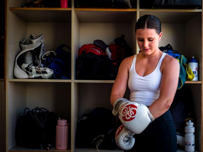 Tyla McDonald straps on her boxing gloves. Pictures: Archivist Media