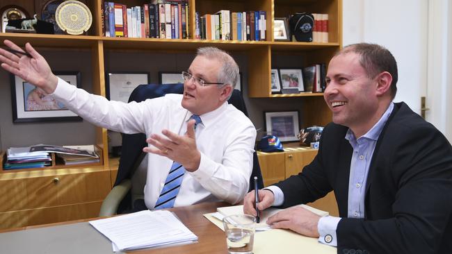 Prime Minister Scott Morrison with Federal Treasurer and Liberal Deputy Leader Josh Frydenberg during a meeting at Parliament House in Canberra on Sunday. Picture: AAP