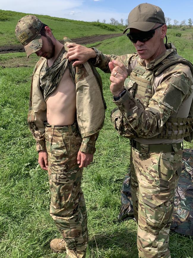 Dr Craig Jurisevic training a Ukranian soldier near the front.