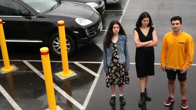 Eastland employees Stephanie Mortlock, Caitlin Khaw and Nick Tsagaris are angry about the new fee sting. Picture: STUART MILLIGAN