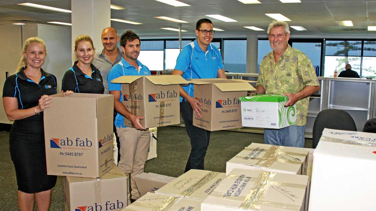 MOVING DAY: HTW Sunshine Coast&#39;s Melitta McDonald, Stacey Sager, Stuart Greensill, Scott Radmall, Duane Gilliland and Peter Degotardi pack up in readiness for the move to Maroochydore. Picture: Erle Levey