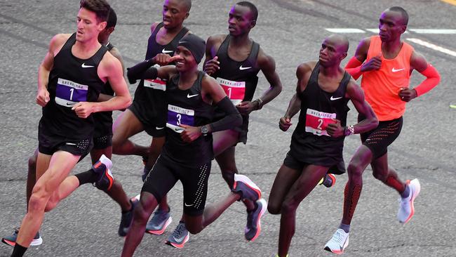 kipchoge breaking 2 shoes
