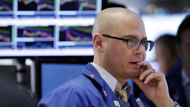 Specialist Mario Picone works at his post on the floor of the New York Stock Exchange, Wednesday, Jan. 6, 2016. U.S. stocks took their second big loss of the week Wednesday on more signs of weakness from China's economy. (AP Photo/Richard Drew)