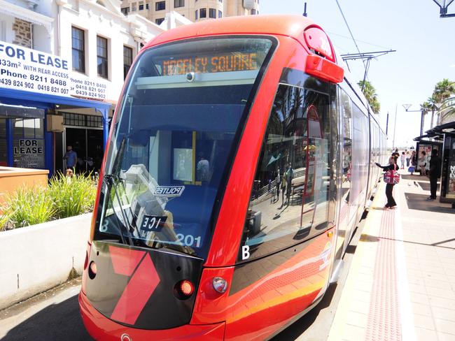 The tram with the Moseley Square sign