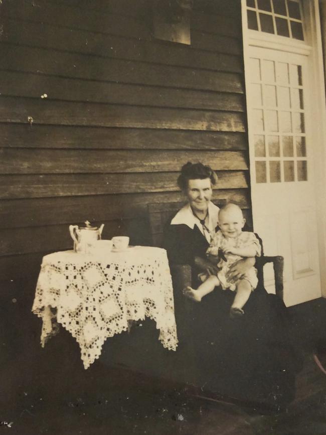 Dr John O’Hagen sitting on his grandmothers knee as a baby. Photo: Supplied