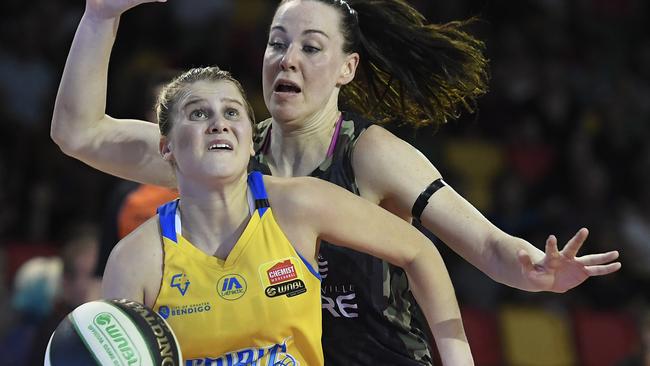 Shyla Heal drives to the basket during the round 16 WNBL match between the Townsville Fire and the Bendigo Spirit earlier this month. Picture: IAN HITCHCOCK/GETTY IMAGES