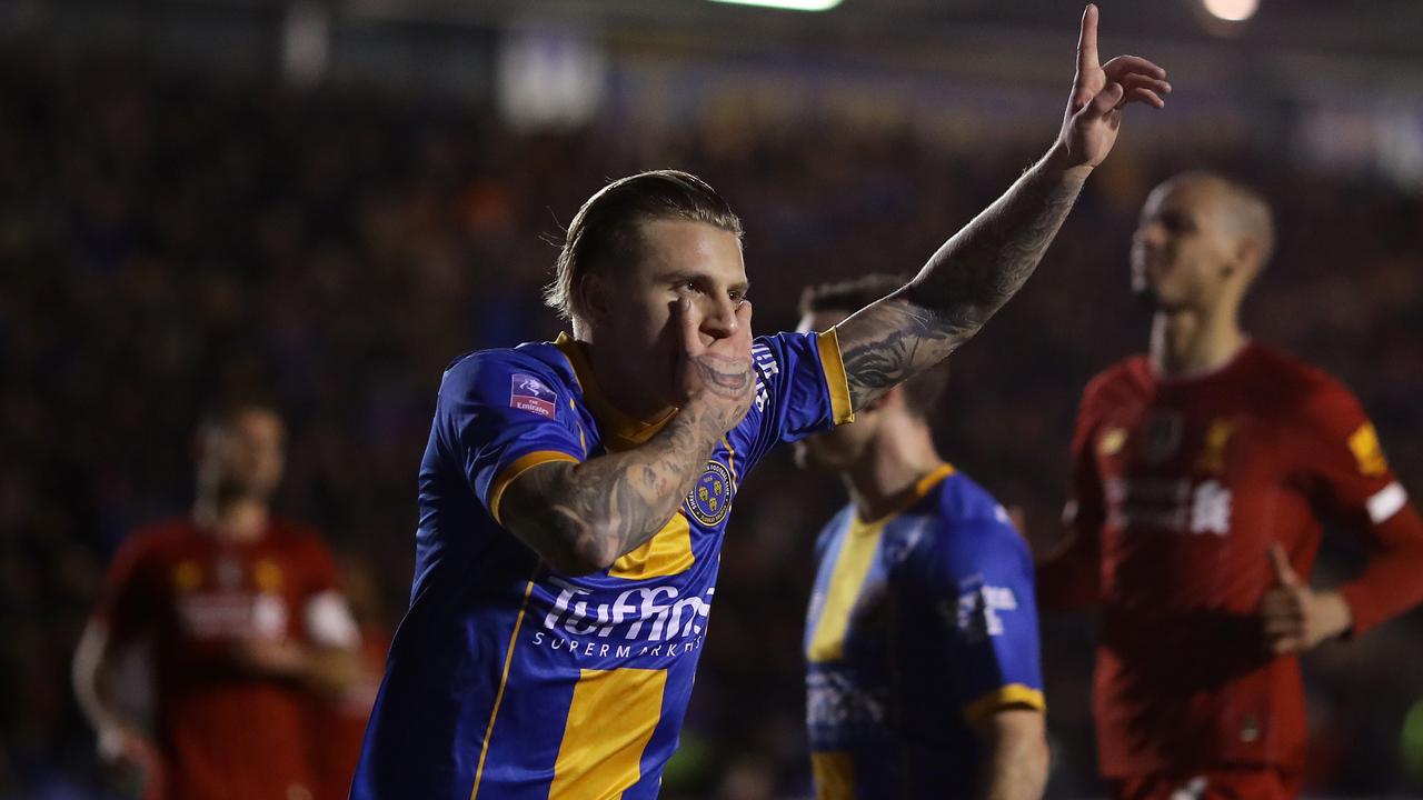 Shrewsbury drew 2-2 with Liverpool to force an FA Cup replay.