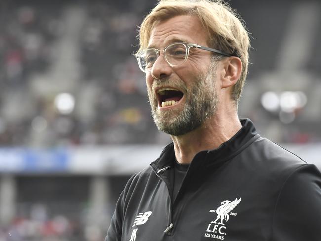 Liverpool's German manager Jurgen Klopp reacts prior the friendly football match Hertha Berlin vs Liverpool in Berlin, Germany, on July 29, 2017.  / AFP PHOTO / John MACDOUGALL