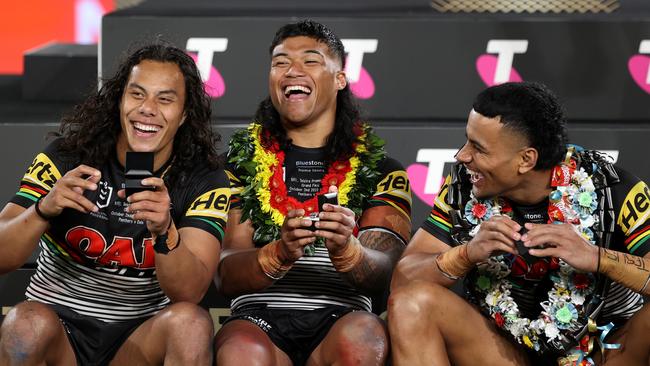 Bad winners? Not a chance. Jarome Luai, Brian To'o and Stephen Crichton show off their new bling. Picture: Getty