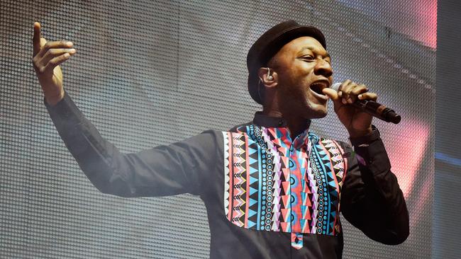 Singer Aloe Blacc performs onstage with record producer Zedd during day 2 of Coachella.