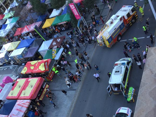 Emergency services attend an incident on George St at the top of the Queen Street Mall. Picture: David Topp/Twitter