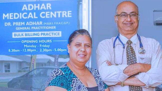 Retiring Redland Bay GP Dr Prem Adhar and his wife outside their practice. Picture: Judith Kerr