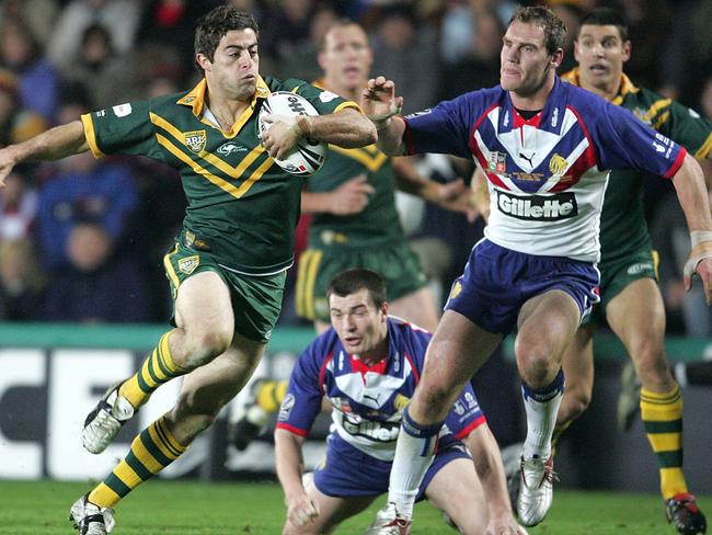 Kangaroos’ Anthony Minichiello breaks through Lions defence during a Great Britain v Australia Tri-Nations series match in Hull. Pic John Clifton