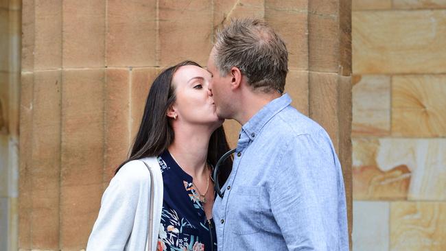 Emily Walker and Justin Lees leave the Adelaide Magistrates Court while facing charges of running an $18 million two-state fraud syndicate. Picture: Brenton Edwards