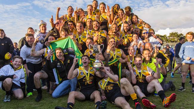 Frankston YCW celebrate a third successive Peninsula league premiership. Picture: Valeriu Campan