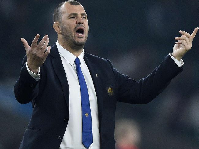 Australia's head coach Michael Cheika reacts prior to a Pool A match of the 2015 Rugby World Cup between England and Australia at Twickenham stadium, south west London, on October 3, 2015. AFP PHOTO / MARTIN BUREAU RESTRICTED TO EDITORIAL USE, NO USE IN LIVE MATCH TRACKING SERVICES, TO BE USED AS NON-SEQUENTIAL STILLS