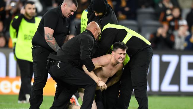 Austero employee Matthew Cooper streaking at Bankwest Stadium. Picture: Joel Carrett