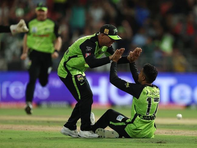 SYDNEY, AUSTRALIA - JANUARY 22: Tanveer Sangha of the Thunder celebrates after taking the wicket of Glenn Maxwell of the Stars  during the BBL The Knockout match between Sydney Thunder and Melbourne Stars at ENGIE Stadium on January 22, 2025 in Sydney, Australia. (Photo by Robert Cianflone/Getty Images)