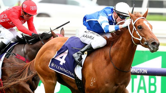 MELBOURNE, AUSTRALIA - FEBRUARY 15: Jockey Mark Zahra rides Gytrash to win race 7 the Black Caviar Lightning during Melbourne Racing at Flemington Racecourse on February 15, 2020 in Melbourne, Australia. (Photo by Kelly Defina/Getty Images)