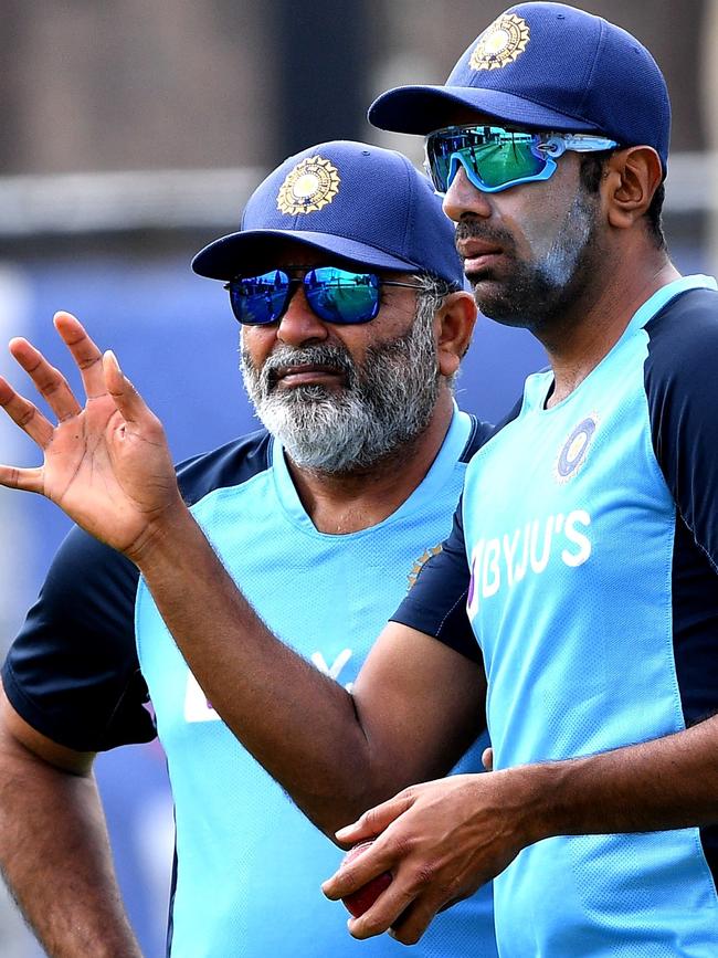 India’s Ravi Ashwin (right) gets ready to bowl during a training session at the Sydney Cricket Ground yesterday. Picture: AFP