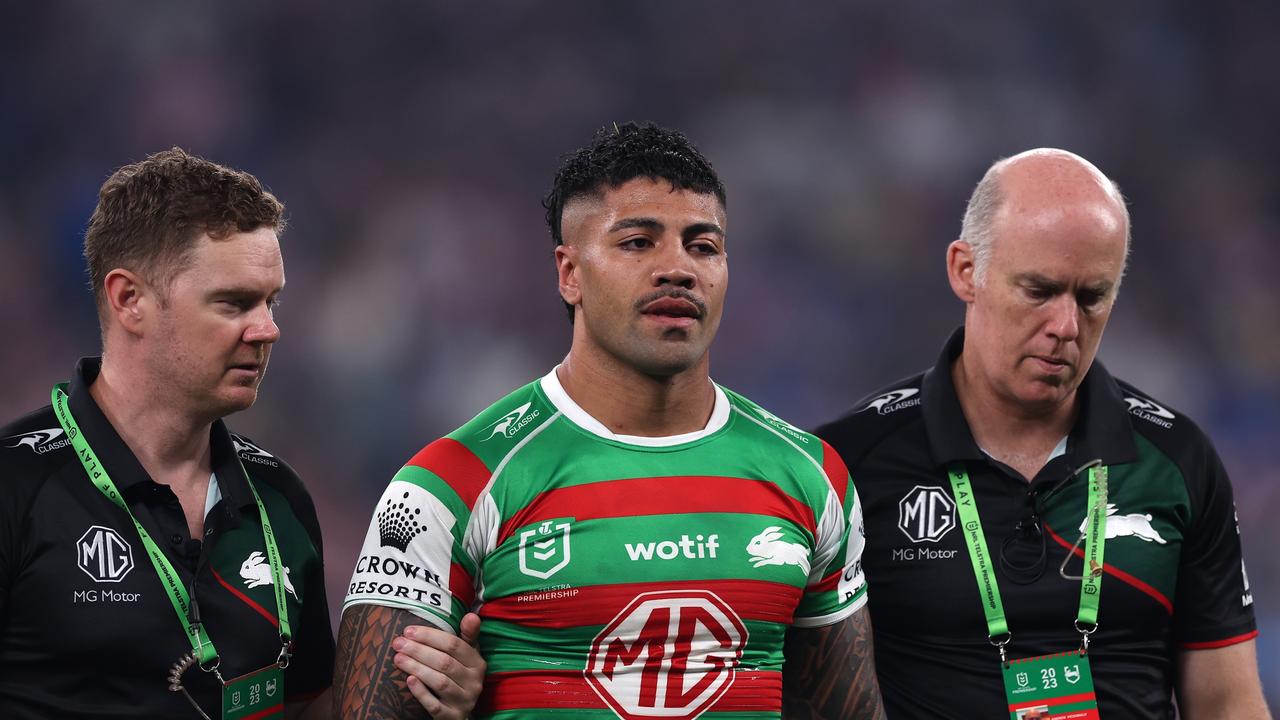 Hame Sele of the Rabbitohs is assisted by team trainers after a tackle during the round three NRL match between Sydney Roosters and South Sydney Rabbitohs. Picture: Getty Images.