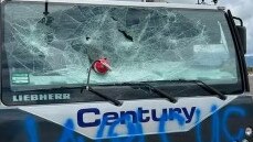 A fire extinguisher was used to smash through the front windscreen of a $2.4m crane during a vandal attack last week. Picture: Supplied.