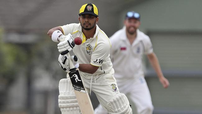 Roshan Laksiri fired with bat and ball for Sunshine United. Picture: Andy Brownbill