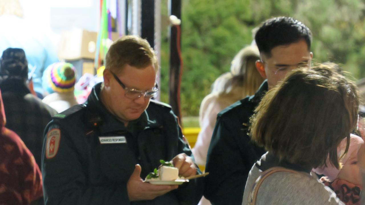 Dozen's braved the cold and rain to enjoy Territory Day at Anzac Oval in Alice Springs. Picture: Gera Kazakov