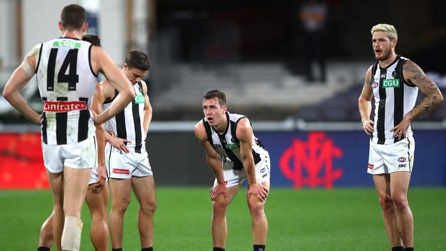 The Magpies react after losing their Round 12 match against Melbourne. Picture: Jono Searle/AFL Photos/via Getty Images