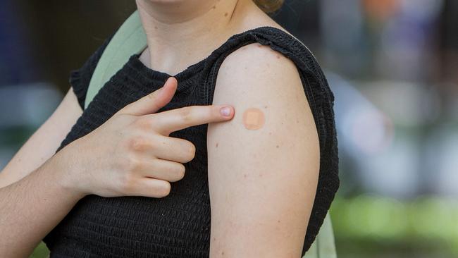 Ella Herring, 18, from Toowong (0499 923 535) after having her second COVID 19 vaccine at the Brisbane Convention & Exhibition Centre on Wednesday, 24 November 2021. Picture: Jerad Williams