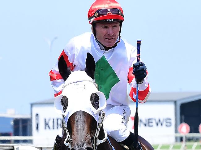 Jockey Paul Hamblin giving the fist pump after winning on Hard Stride. Picture: Grant Peters/Trackside Photography