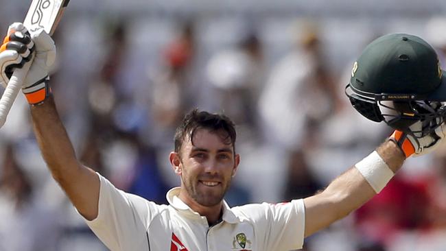 Glenn Maxwell celebrates his maiden Test century.