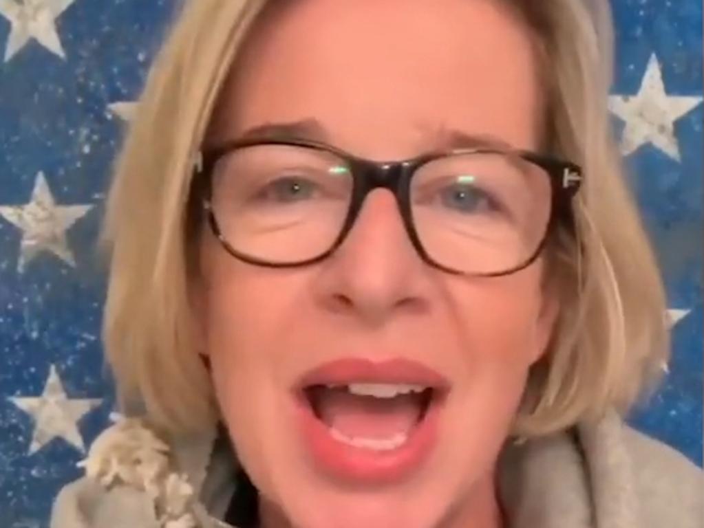 Still from Katie Hopkins video of her holding a sign saying 'SOD OFF' (Supplied)