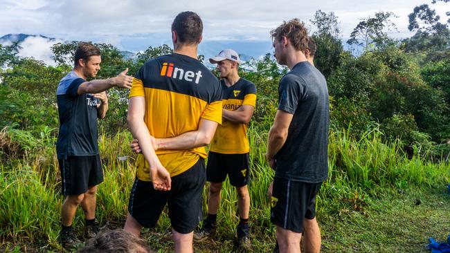 Assistant coach Sam Mitchell talks tactics and trails with young Hawks.