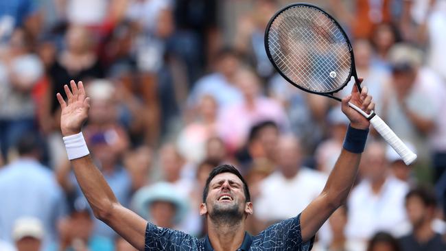 Novak Djokovic celebrates his fourth-round win over Jaoa Sousa. Picture: Getty Images.