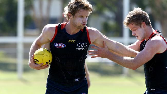 Rory Sloane (left) sweats it out on the Gold Coast. Picture: AAP