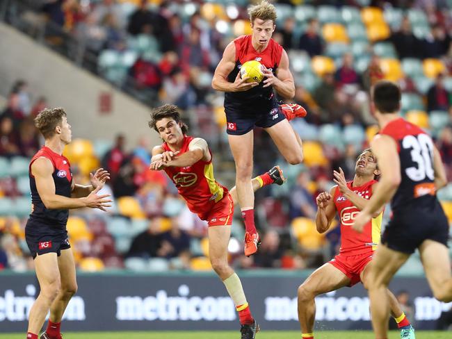 Mitch Hannan takes a hanger for the Demons. Picture: Getty Images